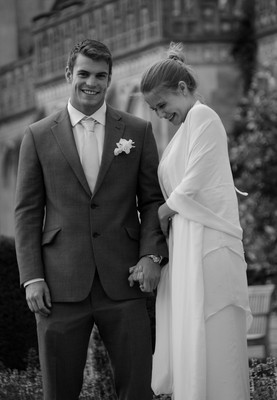 Bride laughing and Groom